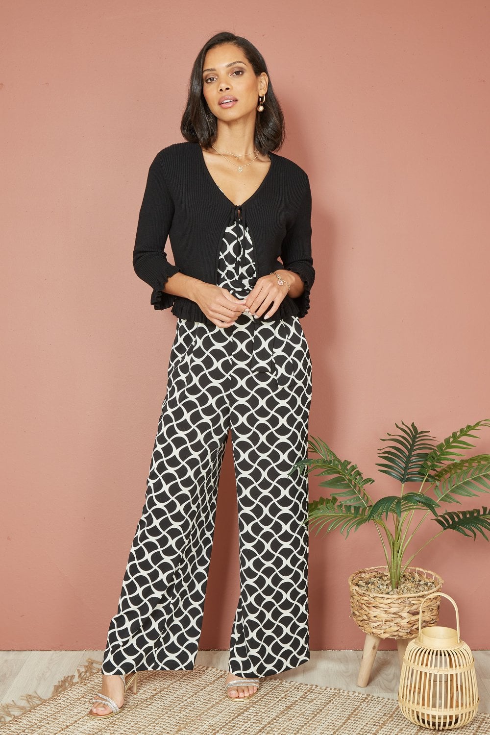 Yumi Black Tie Up Ribbed Cardigan With Frill Hem