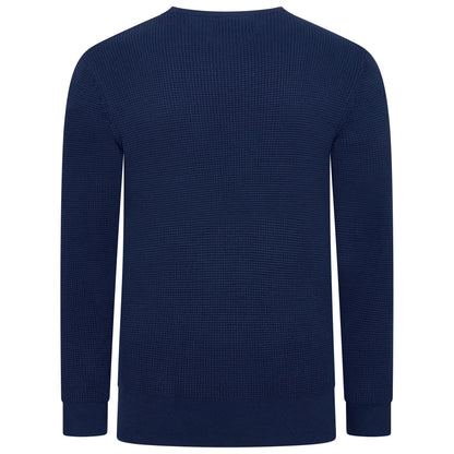 A navy blue long-sleeve crewneck sweater with a textured waffle knit pattern, shown from the back on a plain white background.