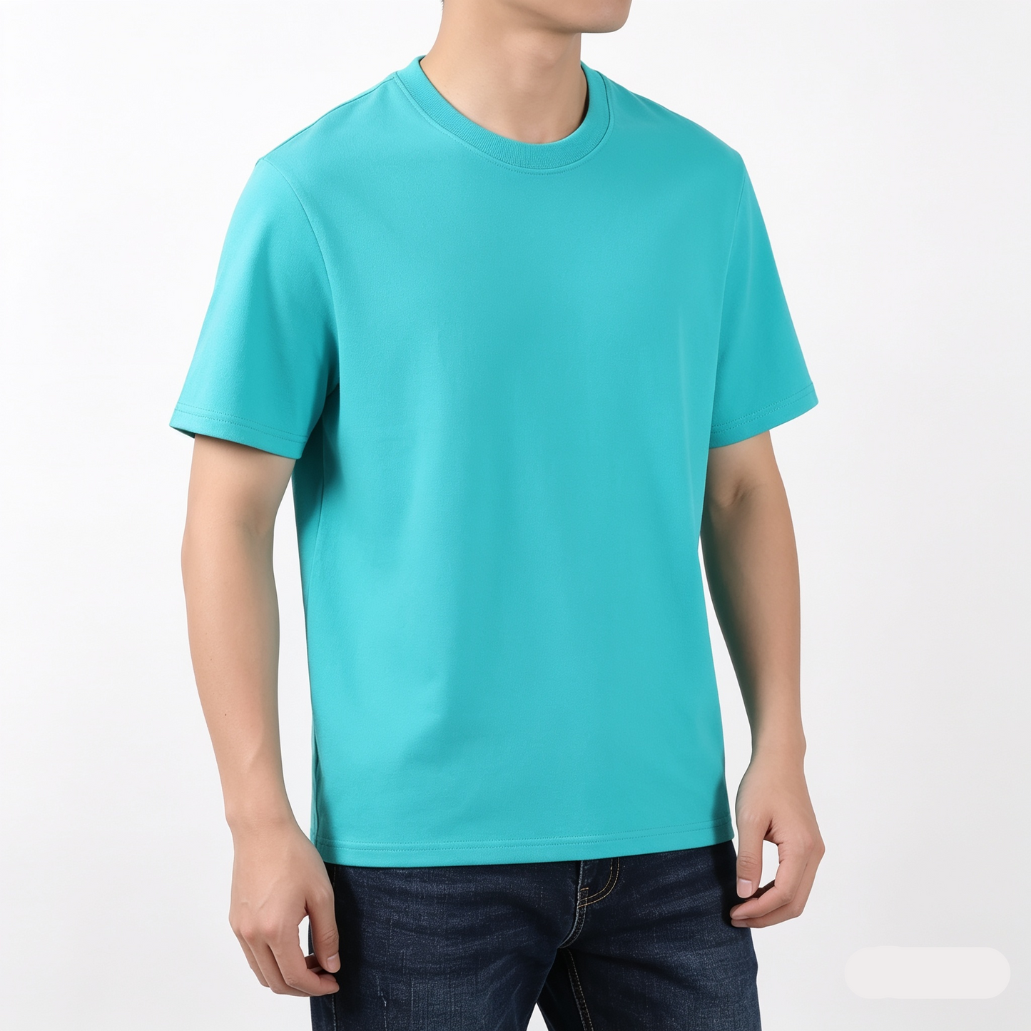 Person wearing a turquoise t-shirt on a white background