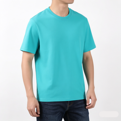 Person wearing a turquoise t-shirt on a white background