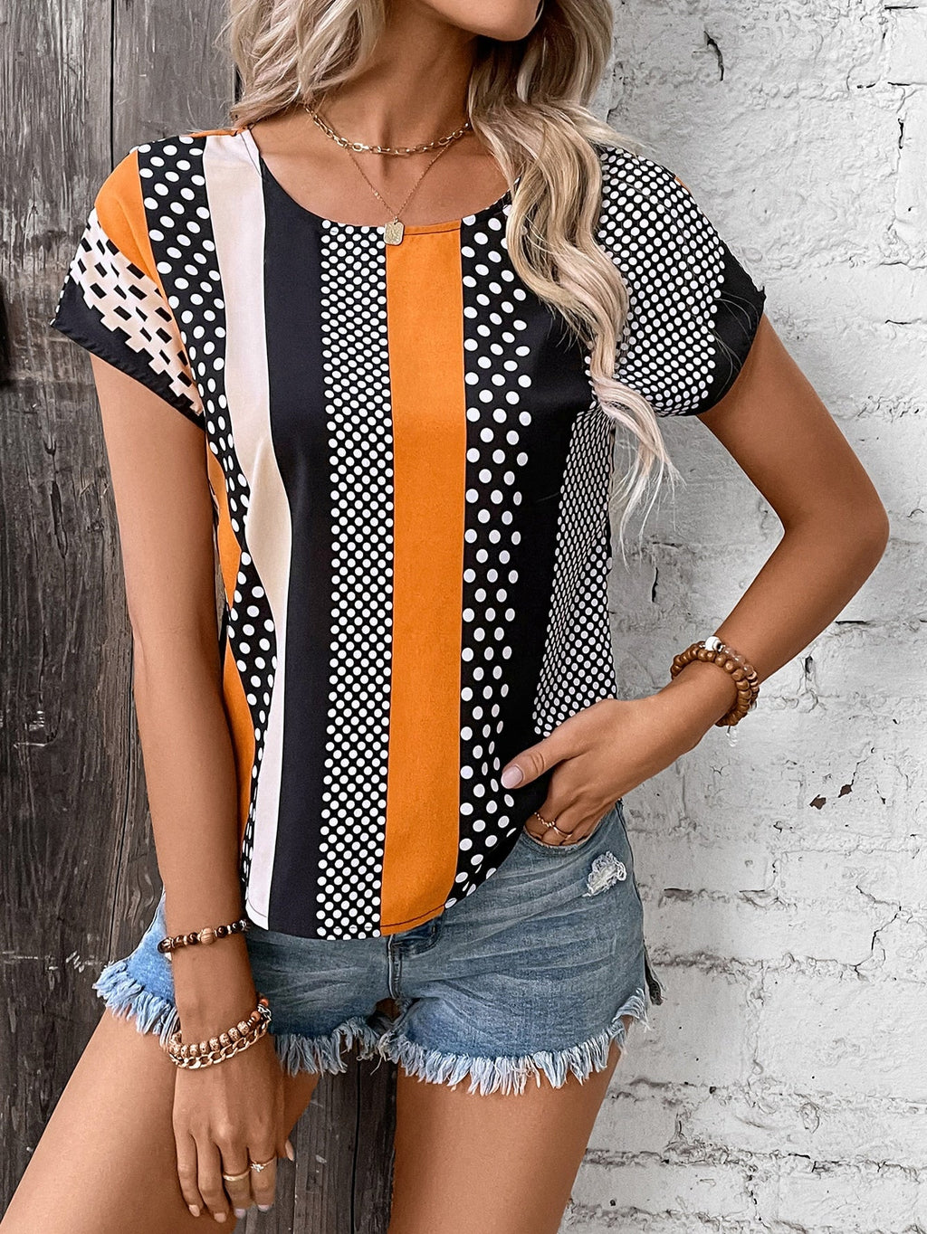 LUNE Polka Dot Print Twist Back Batwing Sleeve Blouse