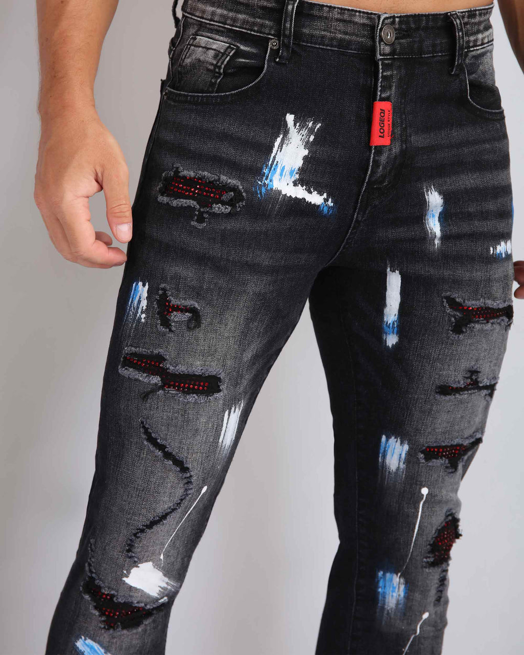 Street Art Chic Ripped Black Jeans with Graffiti Paint Drawing