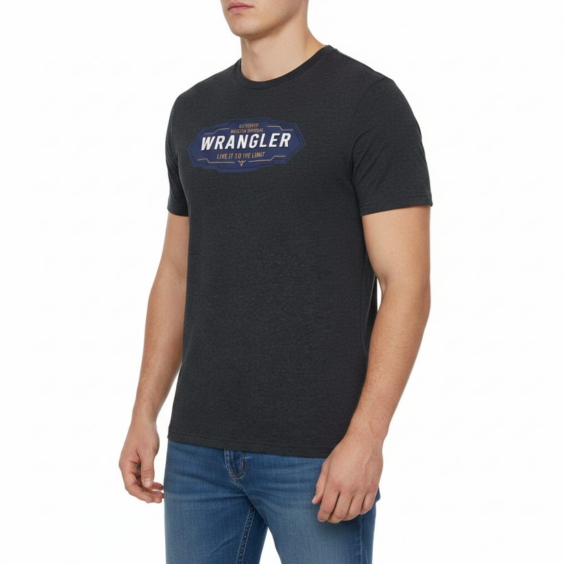 Person wearing a black Wrangler t-shirt on a white background
