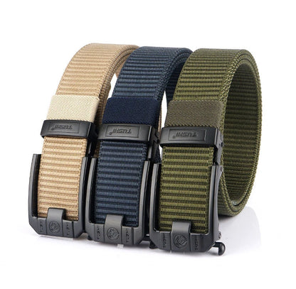 Three tactical belts in beige, navy, and green with black buckles on a white background.