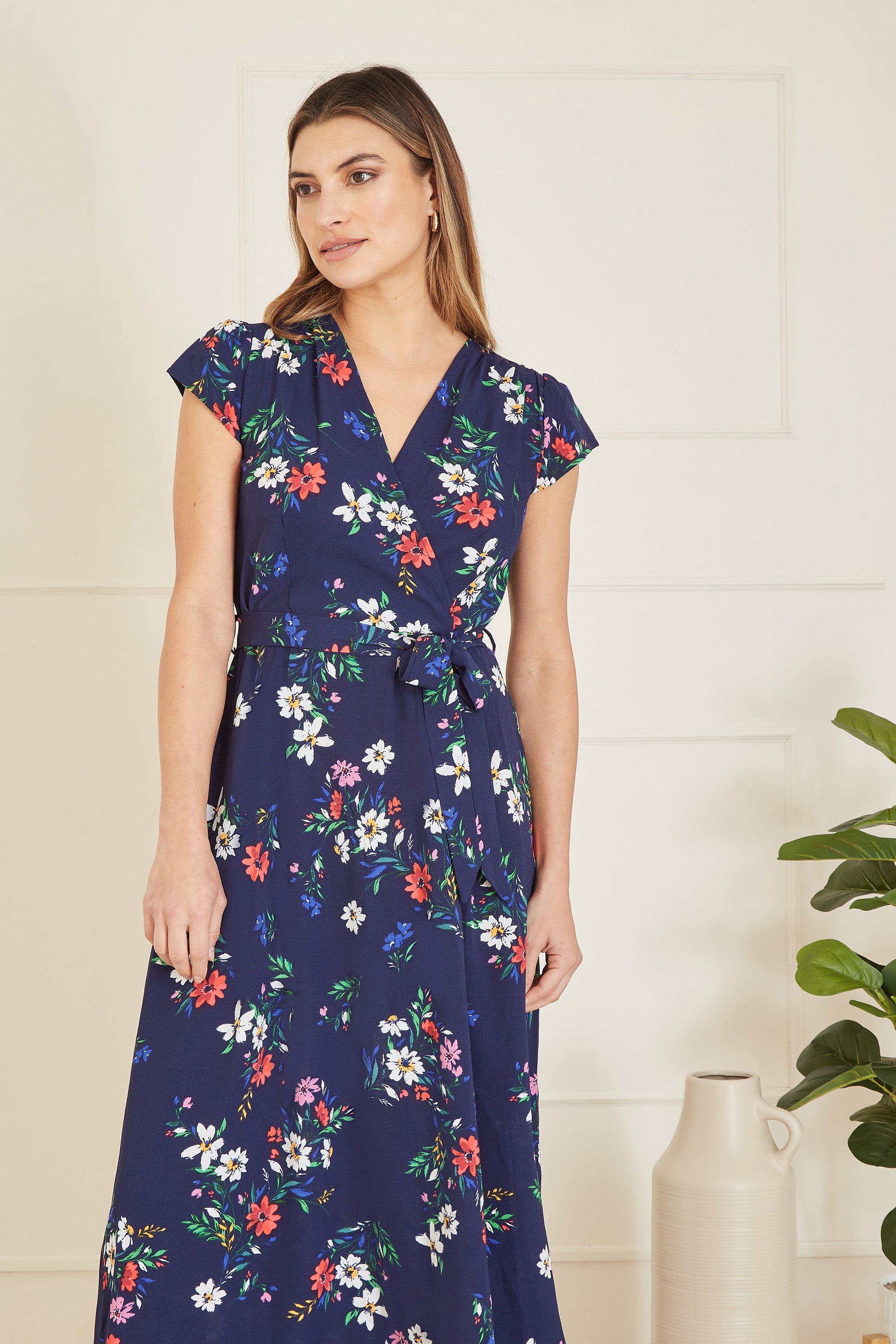 Mela Navy Daisy Print Wrap Over Midi Dress With Dipped Hem