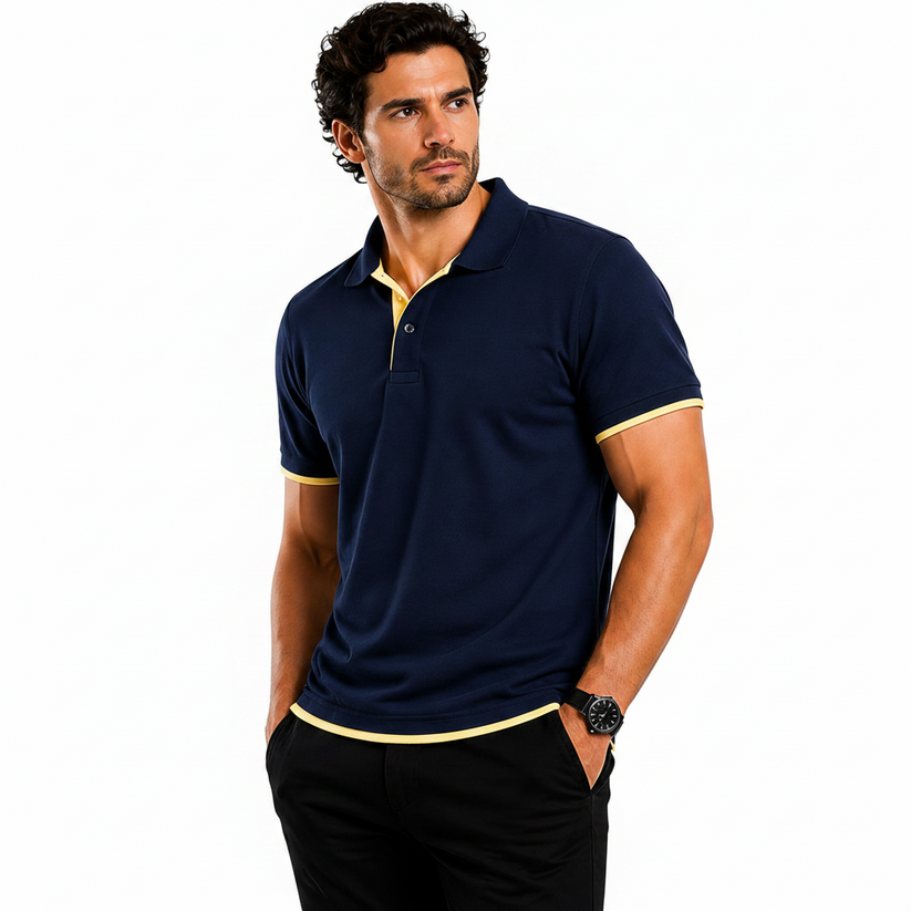 Man wearing a navy blue polo shirt with yellow accents, promotional text about the shirt's features.