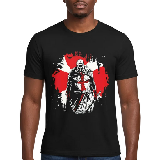 A man wearing a black short-sleeve t-shirt with a graphic print of a knight in armor holding a sword, set against a red and white splattered background.