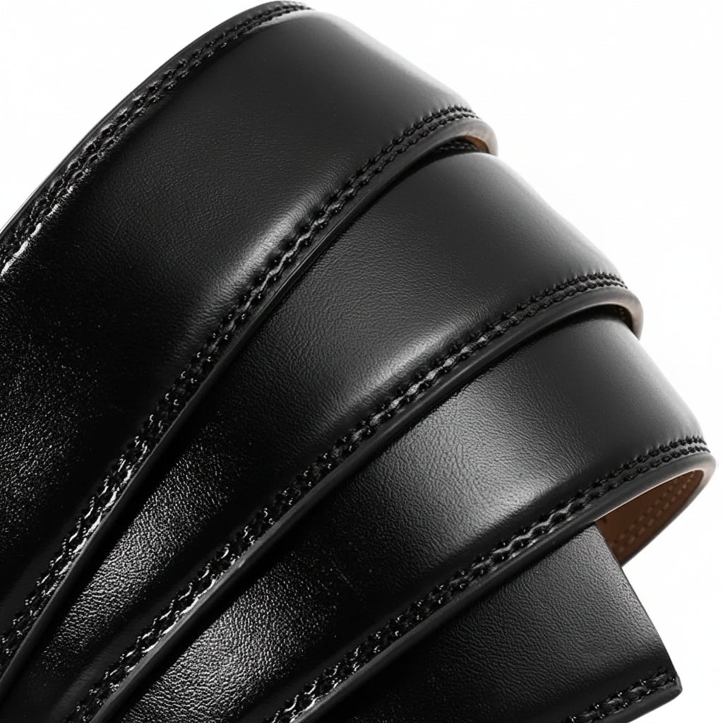 Close-up of a black leather belt with visible stitching on a white background