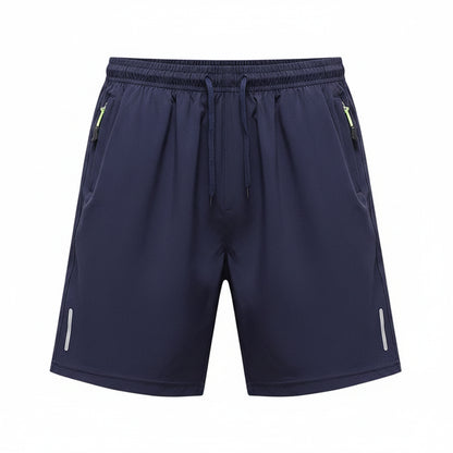 Navy blue shorts with drawstring and side zippers on a white background, branded 'MANTLCONX'.