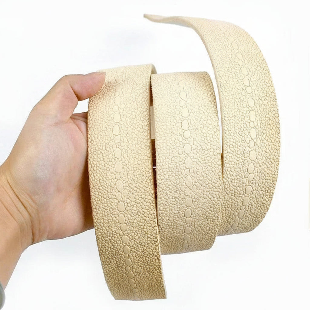 Beige textured belt with a hand holding it, branded 'Deepeel'.