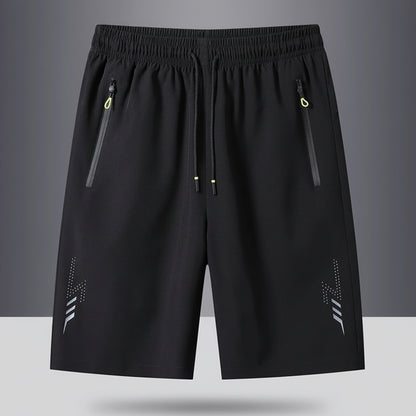 Black shorts with zippers on a gray background, featuring the brand 'MANTLCONX'.