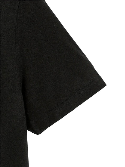 Close-up of a black t-shirt sleeve on a white background