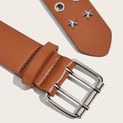 Brown leather belt with silver buckle and star-shaped studs on a light background