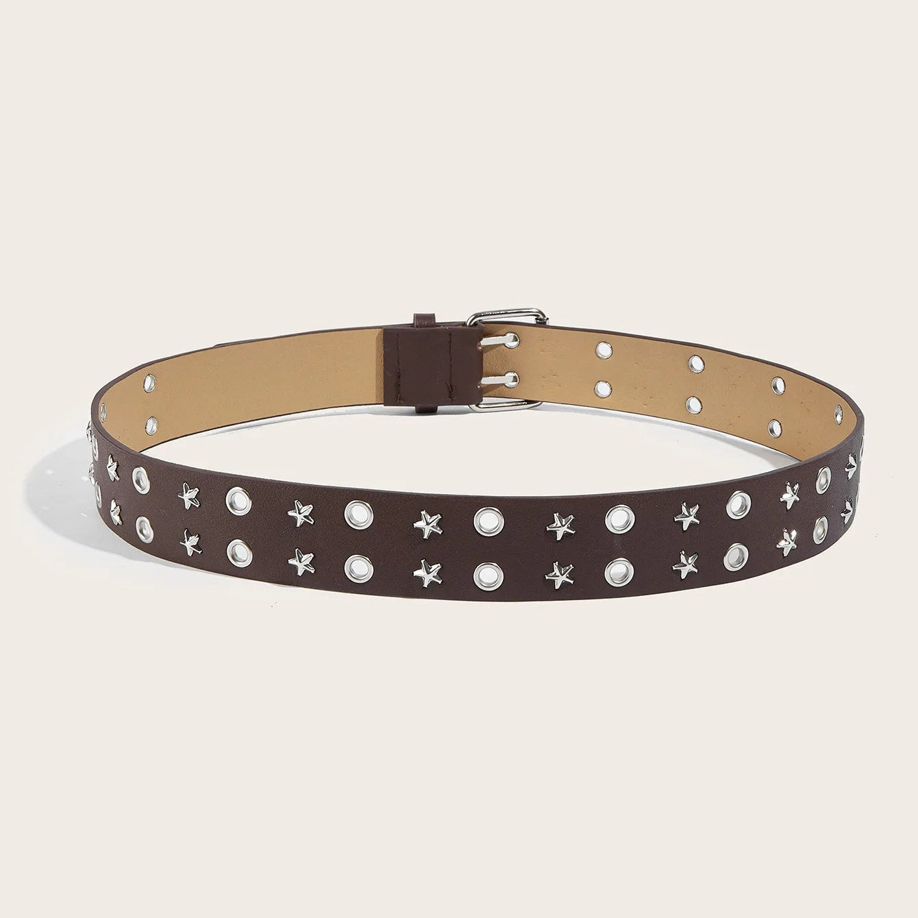Brown belt with star and circle patterns on a beige background