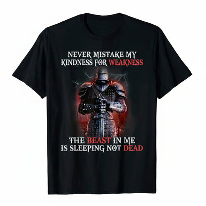 A black short-sleeve graphic t-shirt featuring a medieval knight in armor with the text 'NEVER MISTAKE MY KINDNESS FOR WEAKNESS' and 'THE BEAST IN ME IS SLEEPING NOT DEAD' in white and red lettering.