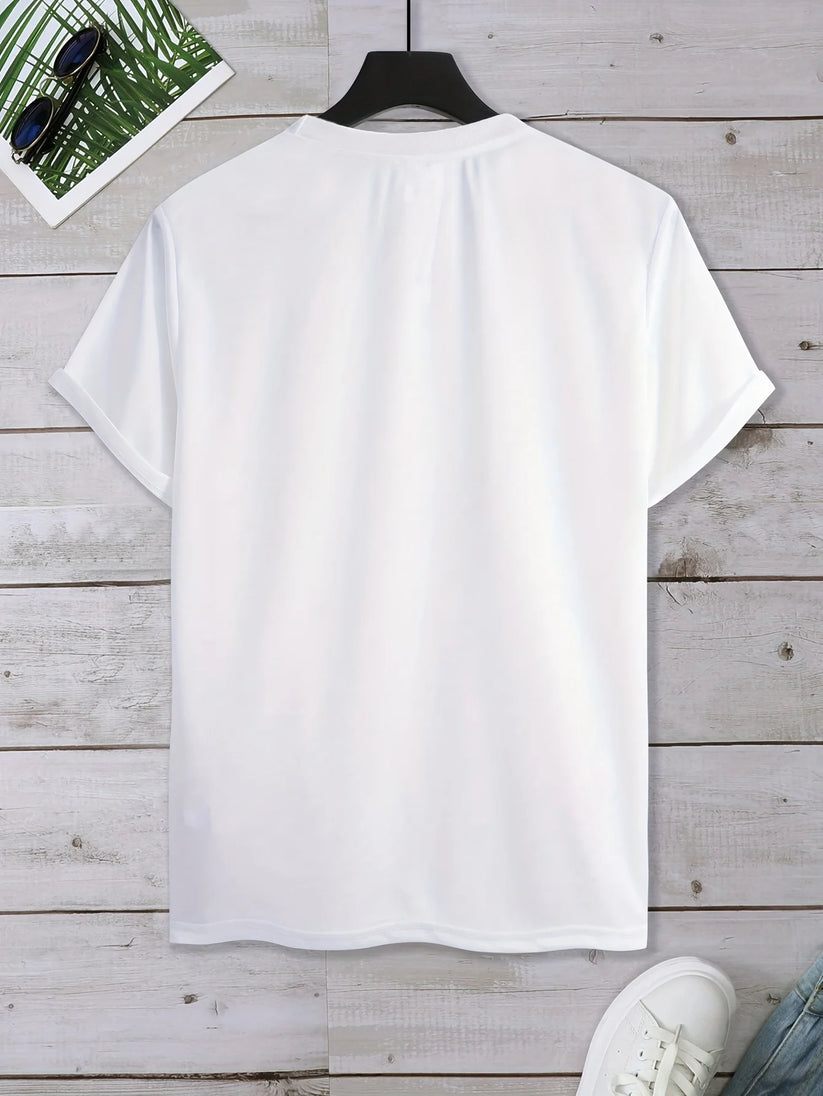 A plain white short-sleeve t-shirt hanging on a black hanger against a light gray wood plank background, with partial styling props visible at the corners.