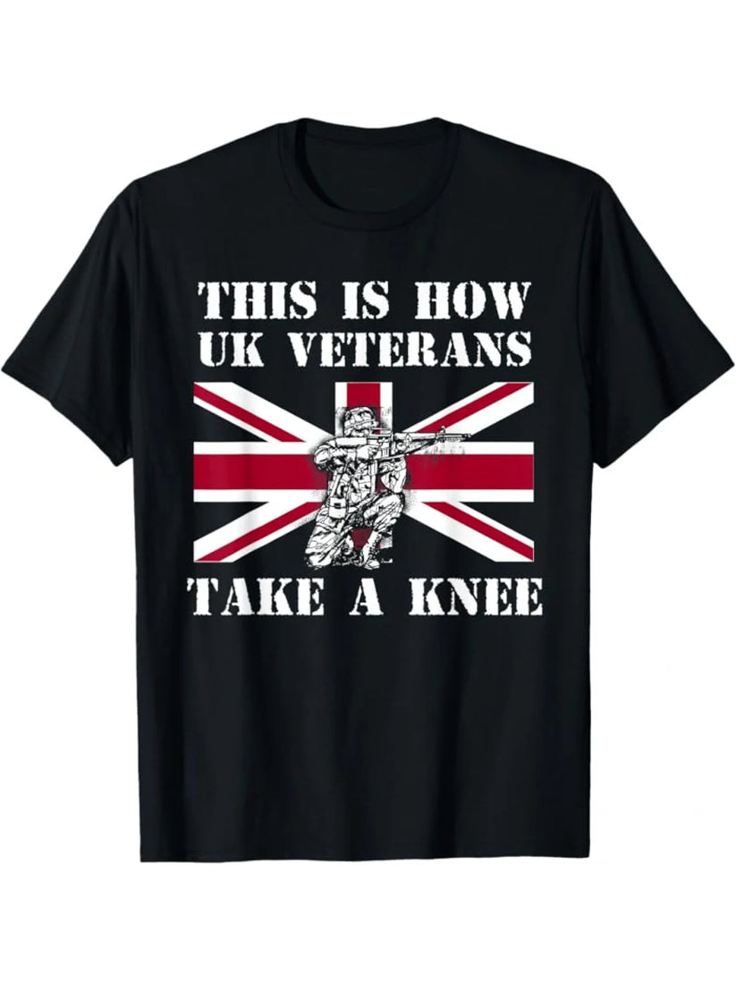 A black short-sleeve crewneck t-shirt featuring a graphic print of the Union Jack flag with a soldier illustration and the text 'THIS IS HOW UK VETERANS TAKE A KNEE' in white.