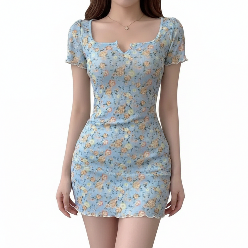 A woman wearing a light blue short-sleeve mini dress with a floral print, featuring a square neckline with a small keyhole cutout and ruffled trim.