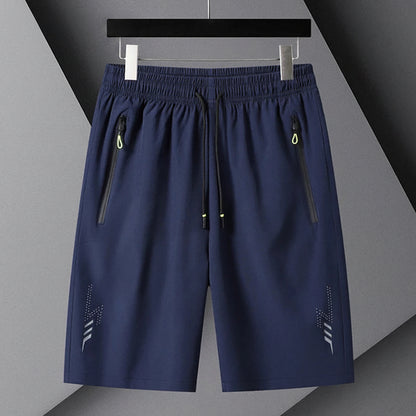 Navy blue shorts with zippers on a gray background