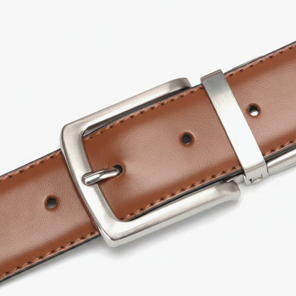 Brown leather belt with silver buckle on a white background