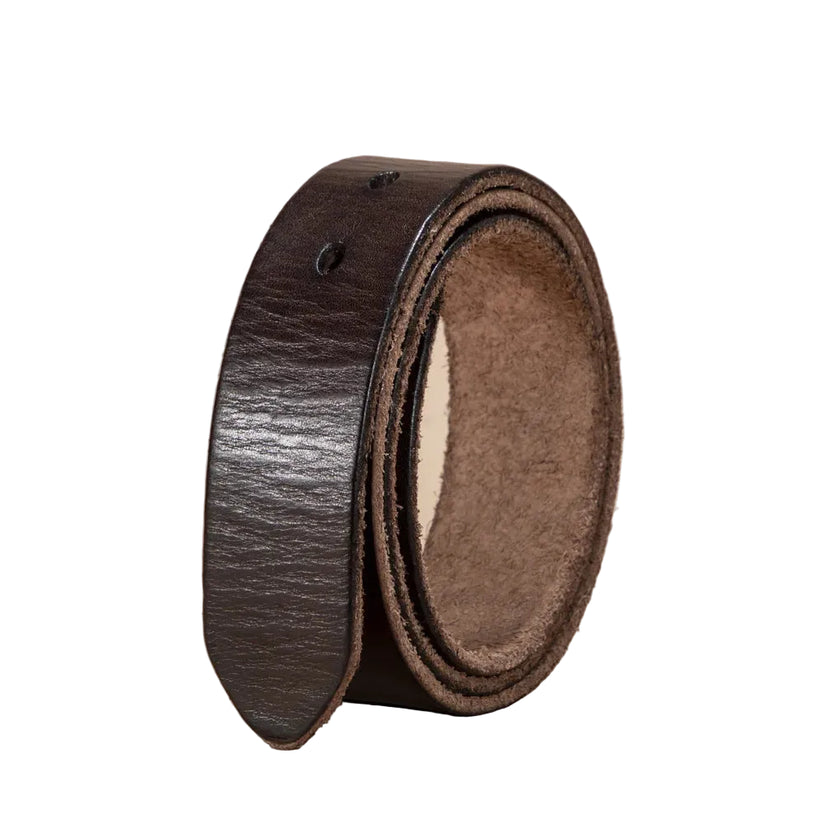 A dark brown leather belt rolled up, showing its textured grain exterior and a lighter tan interior, set against a solid beige background.