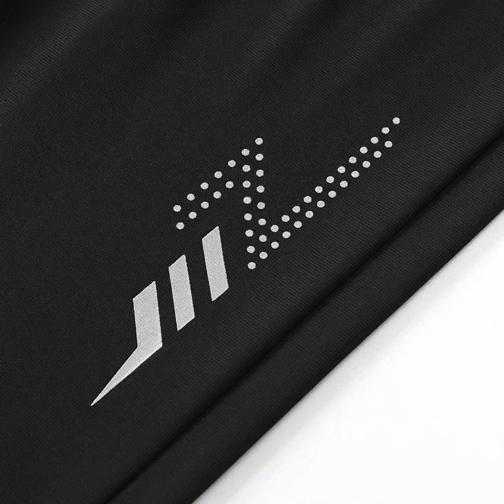 Black fabric with a silver logo and 'MANTLECONX' branding.