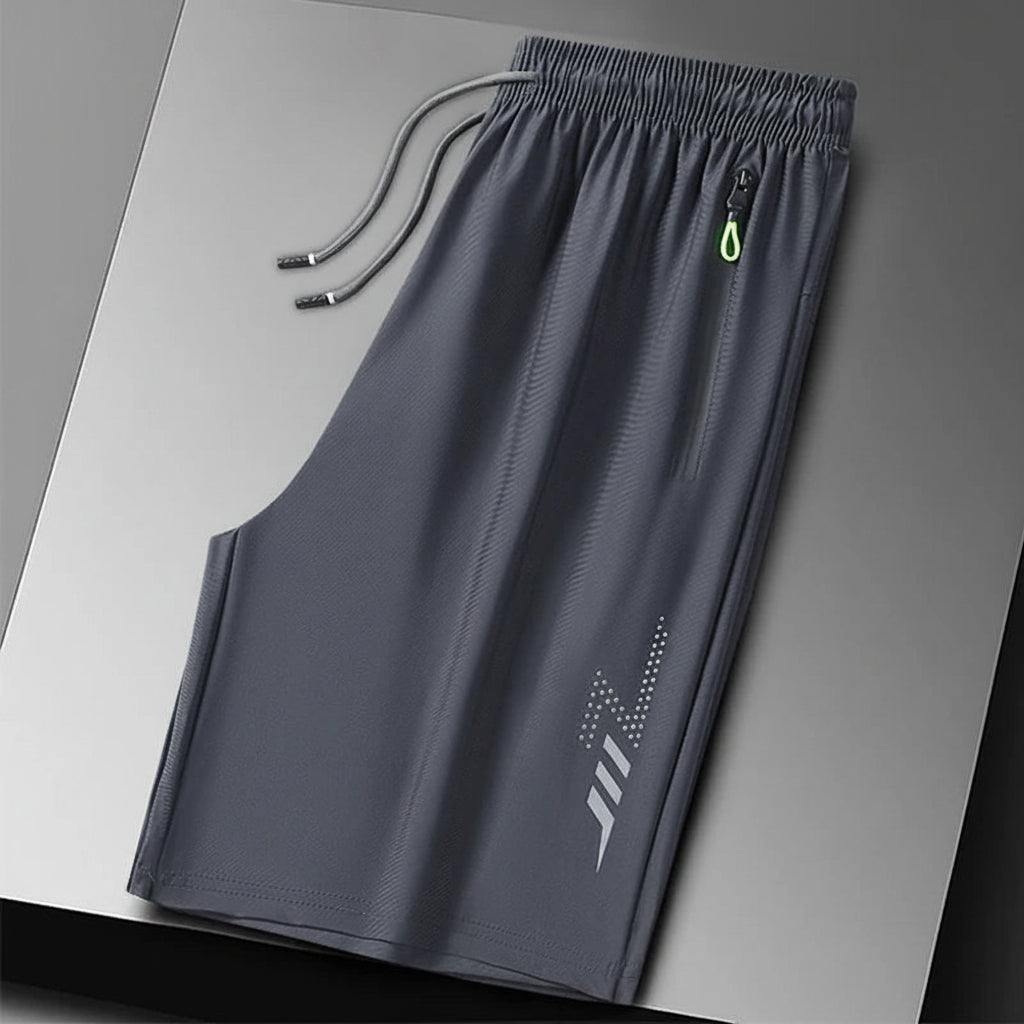 Gray shorts with a brand logo on a gray background