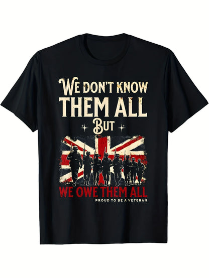 A black short-sleeve crewneck t-shirt with a graphic print on the front. The design features the text 'We don't know them all But we owe them all' in cream and red lettering, a distressed Union Jack flag, and black silhouettes of soldiers.