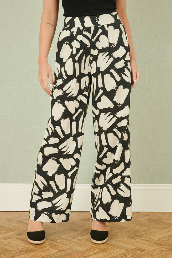 Yumi Black Cotton Splash Print Relaxed Fit Trousers - QHA UK