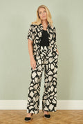 Yumi Black Cotton Splash Print Relaxed Fit Trousers - QHA UK