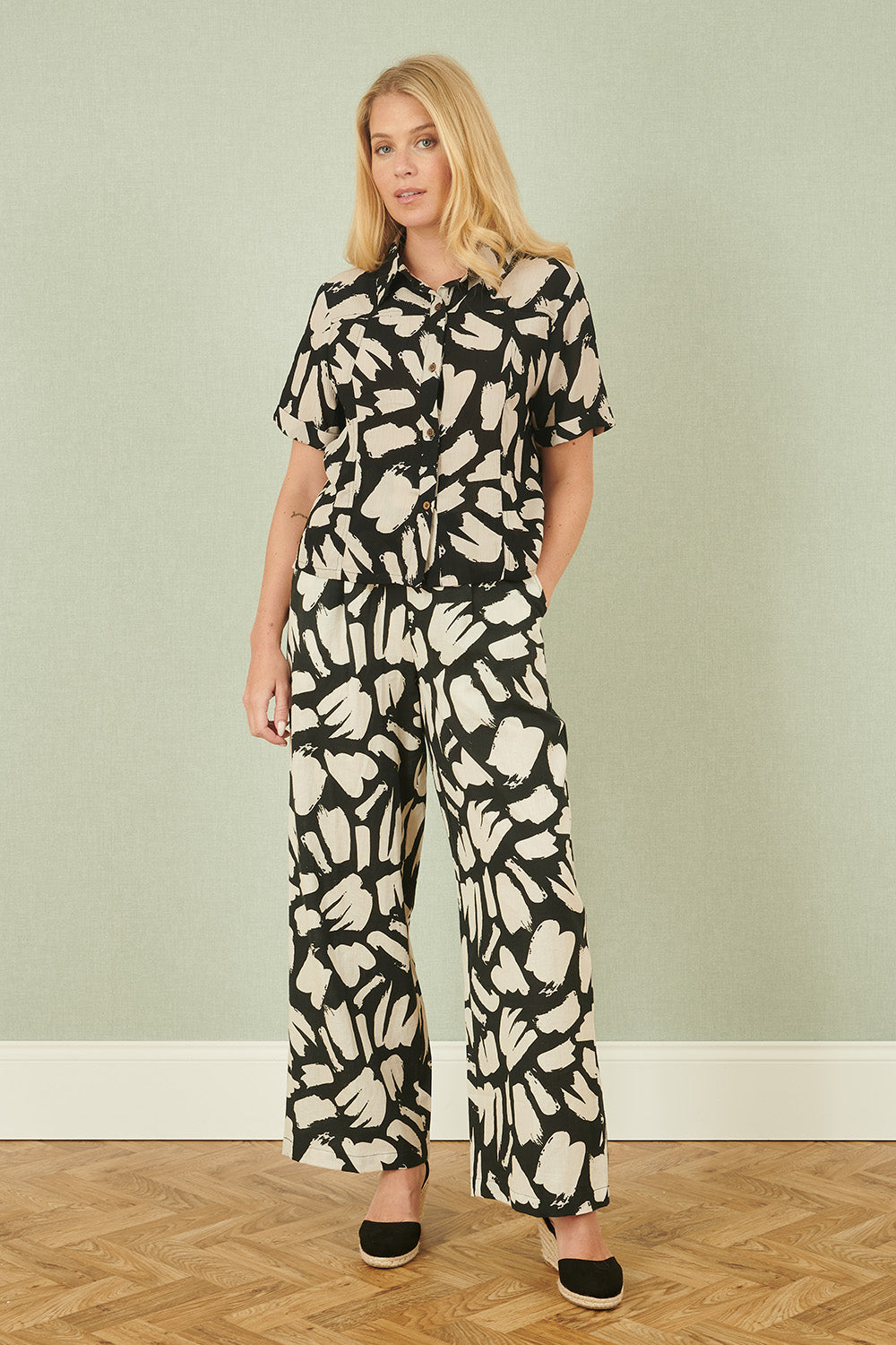 Yumi Black Cotton Splash Print Relaxed Fit Trousers - QHA UK