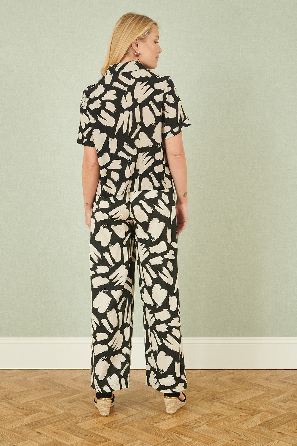 Yumi Black Cotton Splash Print Relaxed Fit Trousers - QHA UK