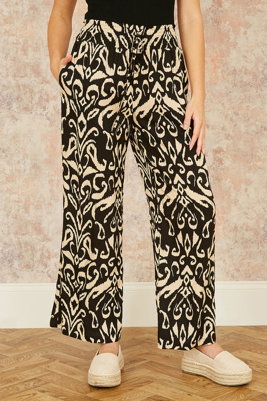 Yumi Black Ikat Print Relaxed Fit Trousers - QHA UK