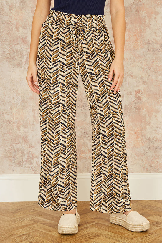 Yumi Brown Animal Print Relaxed Fit Trousers - QHA UK