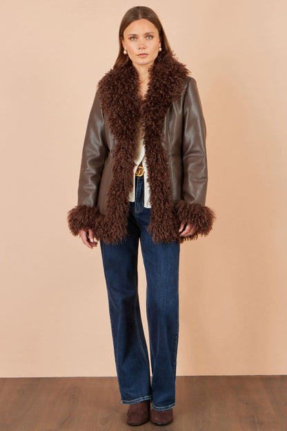 Yumi Women’s Brown Faux Leather Coat with Curly Faux Fur Collar and Trim