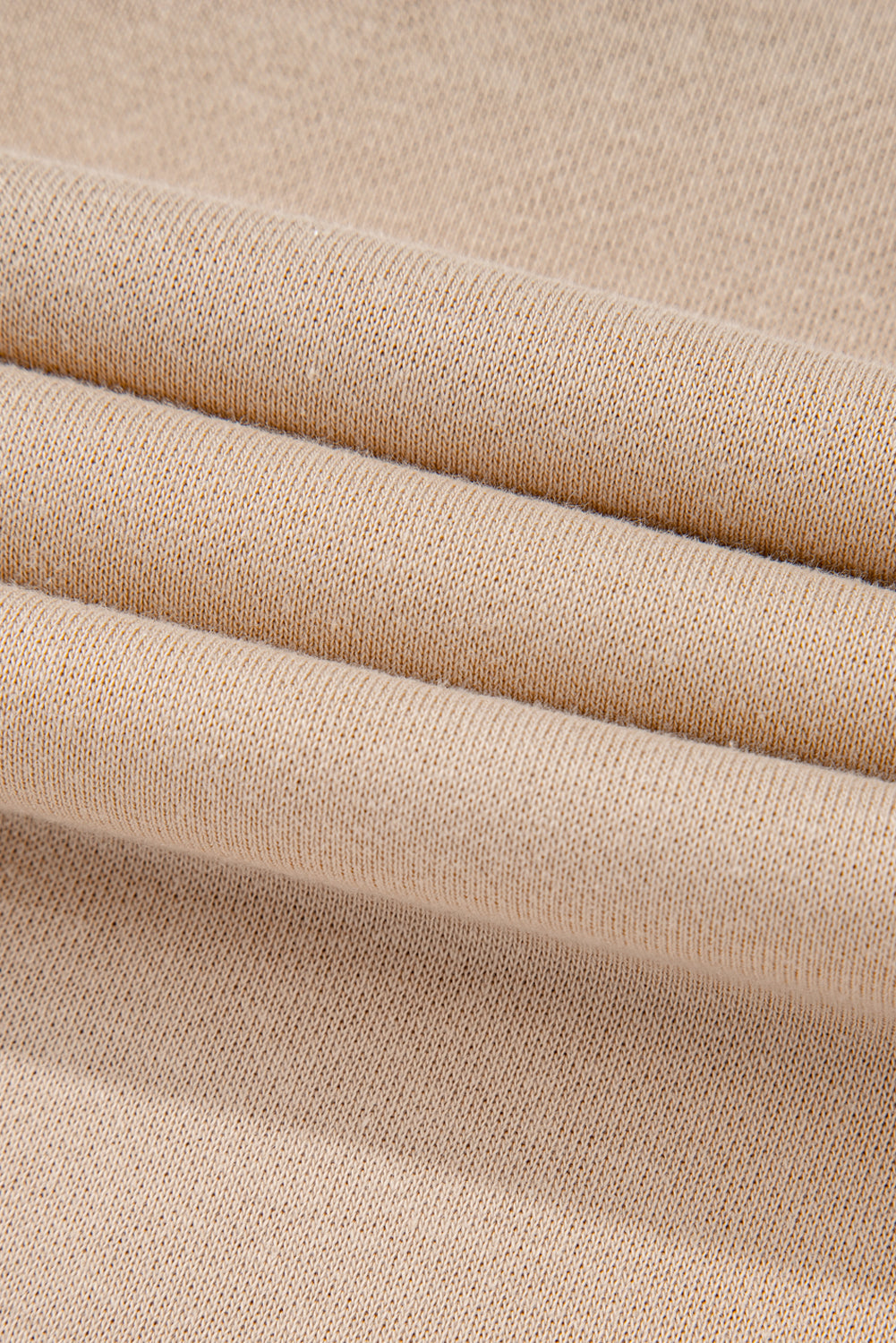 A pale khaki plus-size sweatshirt featuring a floral peace sign graphic and a Washed Terry Finish