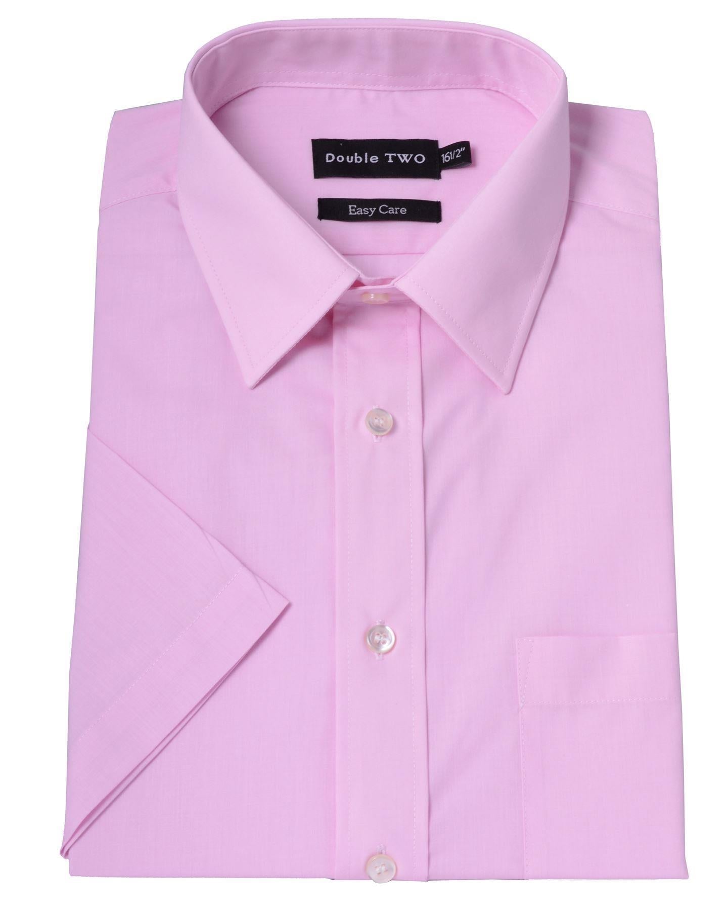 Folded pink dress shirt with short sleeves on a white background