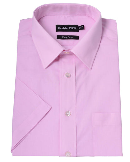Folded pink dress shirt with short sleeves on a white background