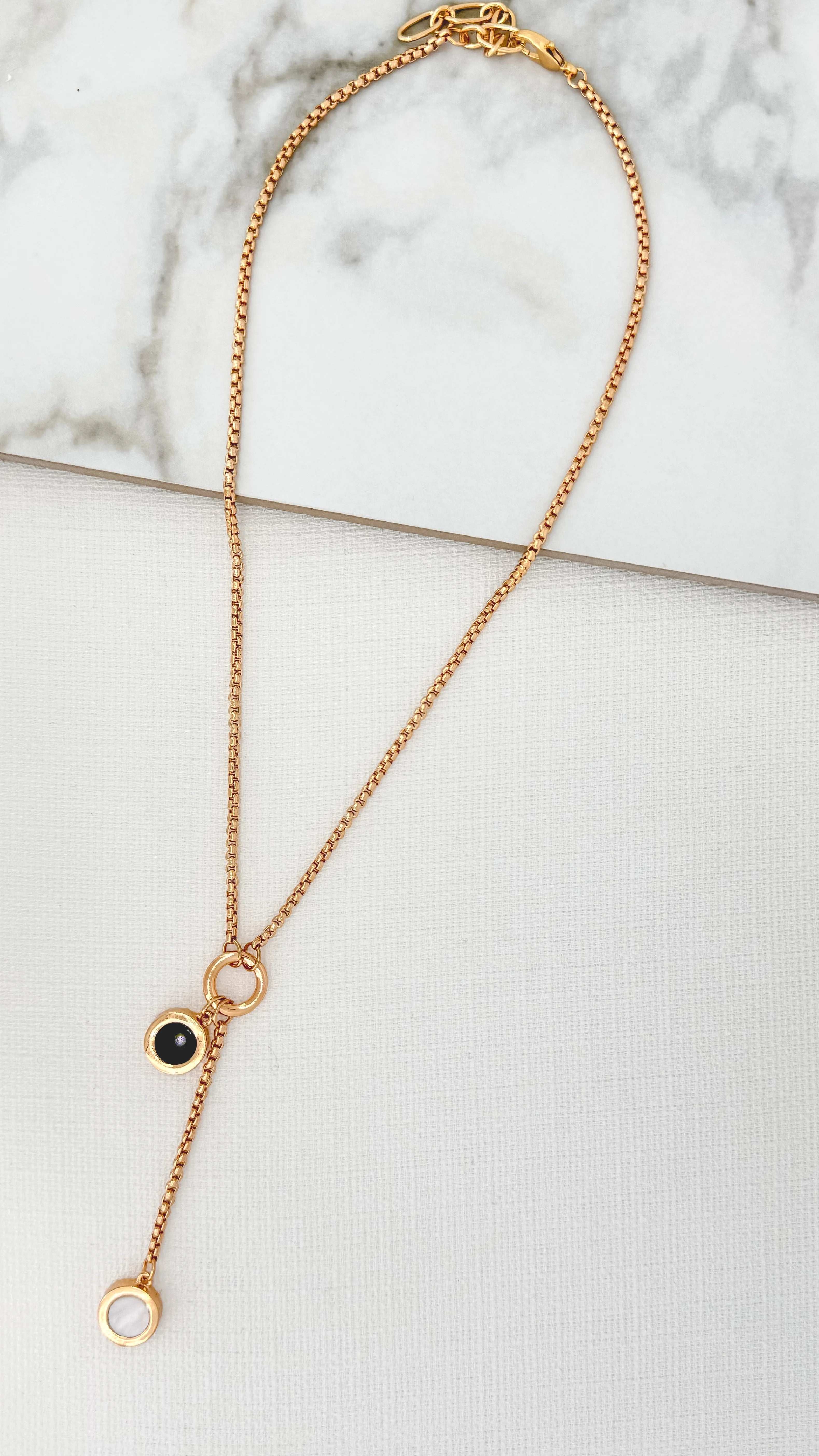 Gold Necklace with Black and White Dropper Pendant