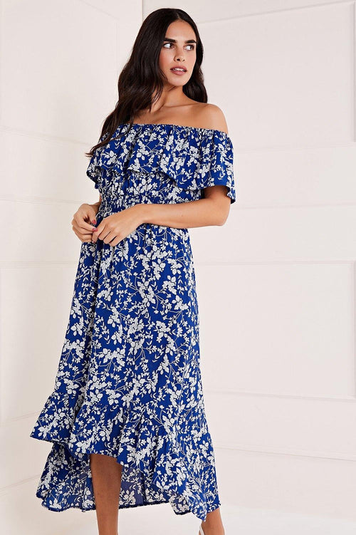Mela Blue Ditsy Print Bardot Dipped Hem Dress - QHA UK