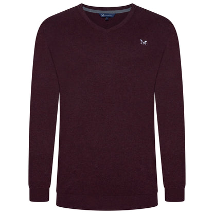 Maroon sweater with a small logo on a white background