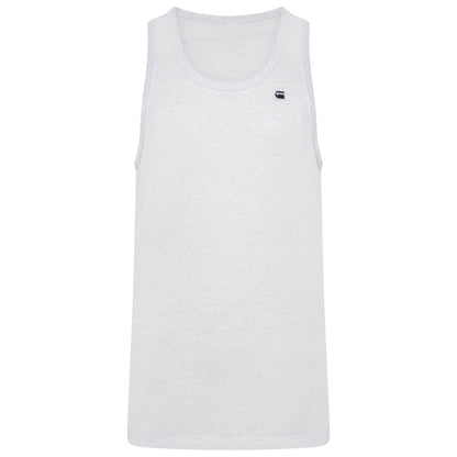 A white sleeveless tank top with a small Lacoste crocodile logo on the left chest, displayed against a solid white background.