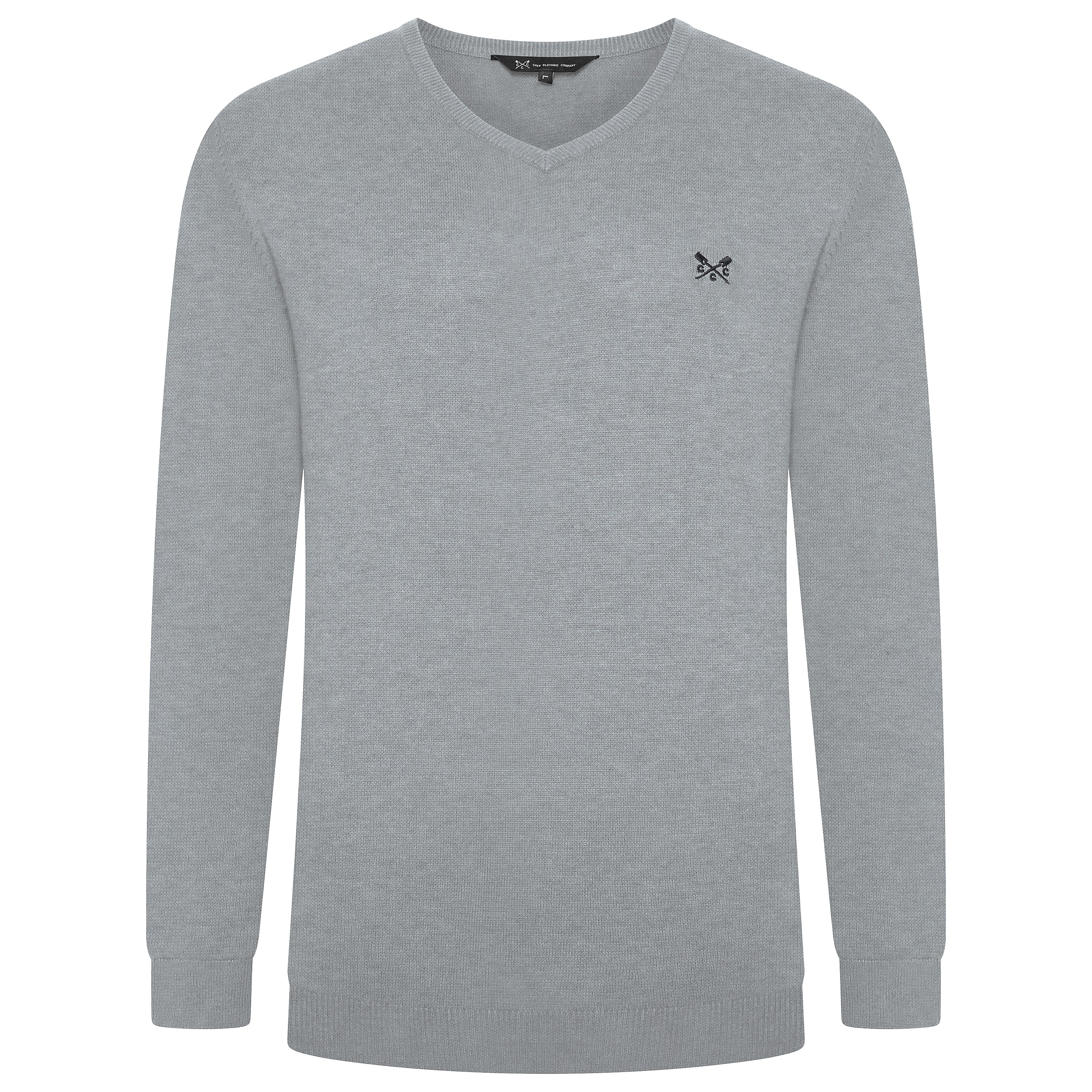 Gray sweater with a small logo on a white background