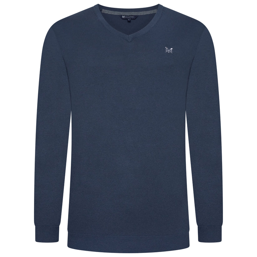 Navy blue long-sleeve shirt with a small logo on a white background