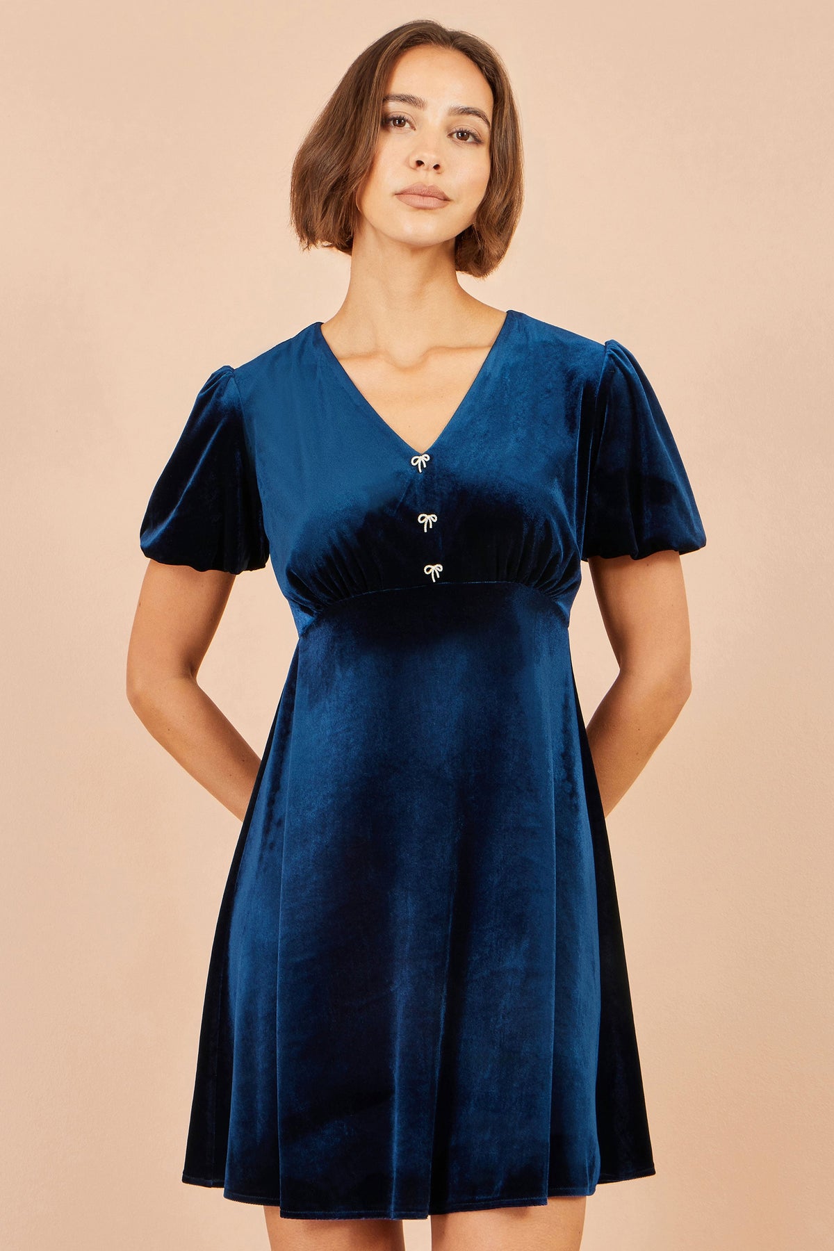 Yumi Velvet Skater Dress Diamante Bow Detail in Navy – Front View